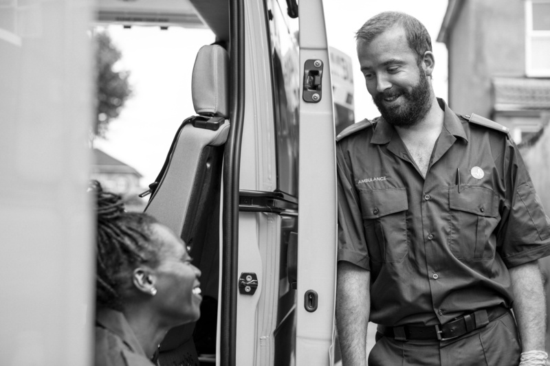 work, mode of transportation, healthcare, adult, day, land vehicle, young adult, waist up, uniform, paramedic, lifestyles, smiling, conversation, service