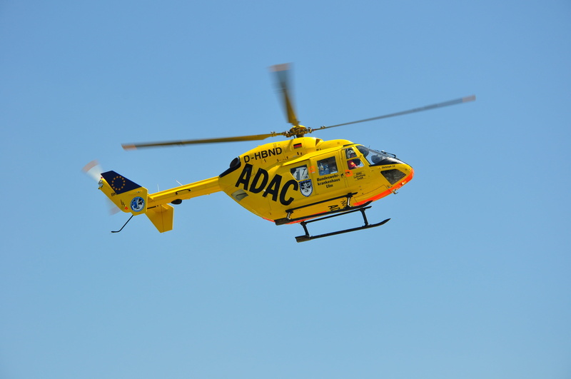 sky, rescue helicopter, flying, helicopter, motion, yellow, airshow, mode of transportation, day, outdoors, air rescue, sunny, clear sky, transportation