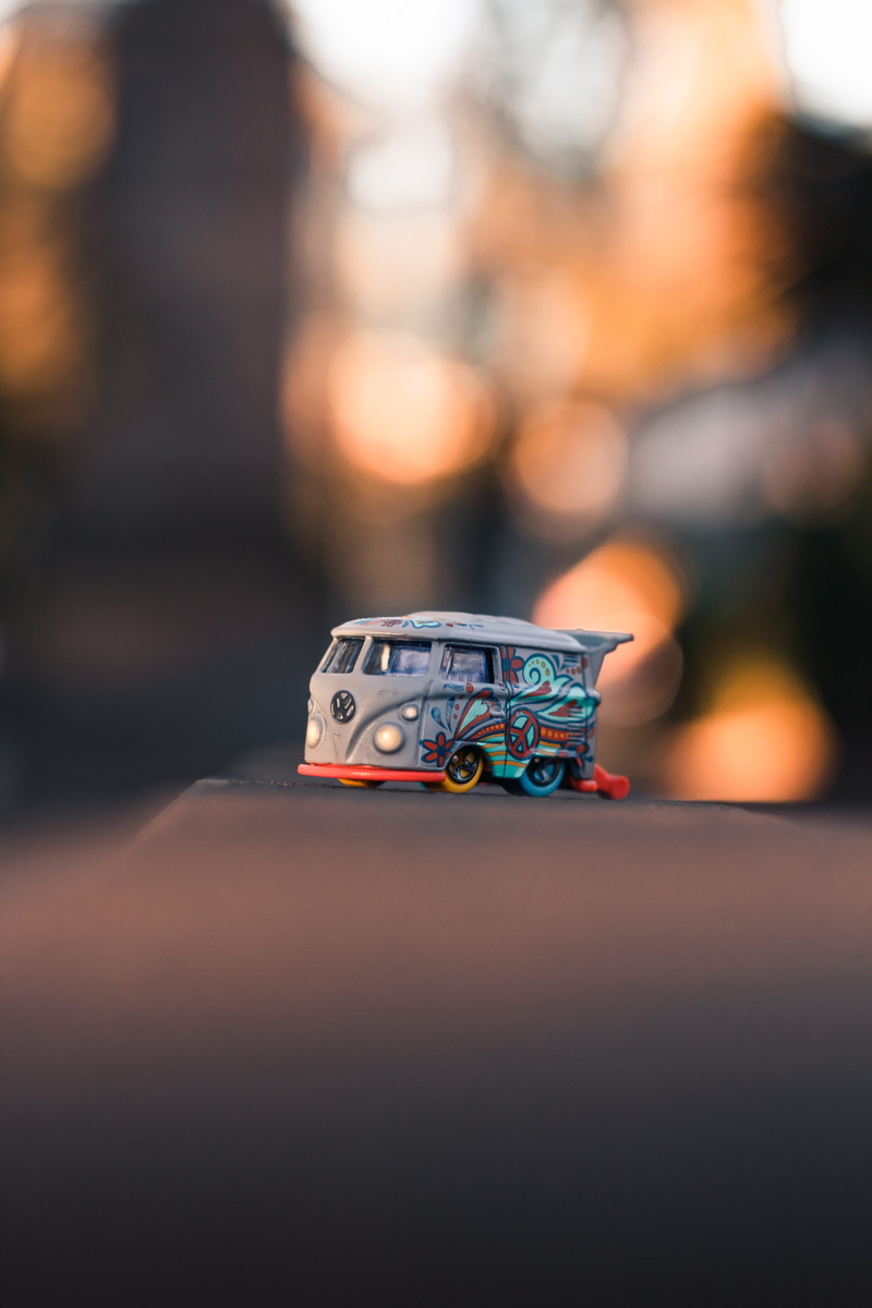 volkswagen, images, vehicle, table, bokeh, human, toy, glass - material, day, container, focus on foreground, single object, toluca, combi, old, close-up
