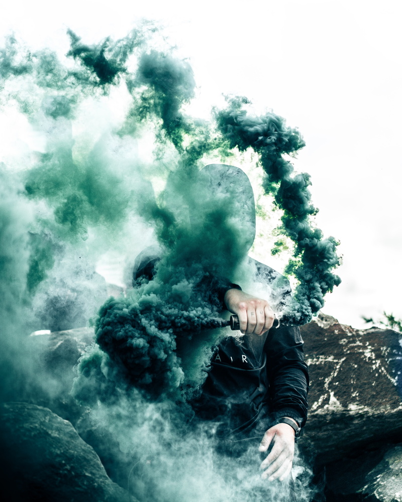 one Person, smoke - Physical Structure, adult, person, steam, holding, lifestyles, obscured face, men, man, smoking, rock, motion, outdoors