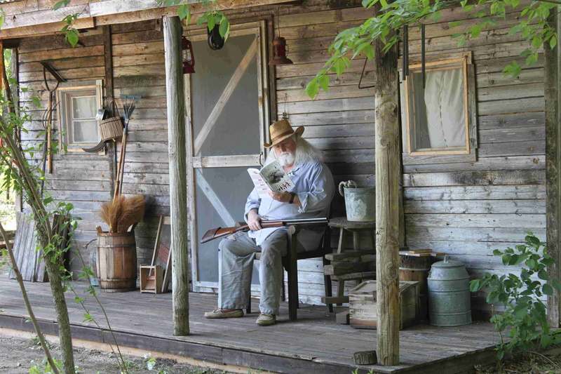 one person, architecture, Scary, scared, wood - material, full length, casual clothing, bench, Person, adult, lifestyles, women, cabin, sitting, hunting