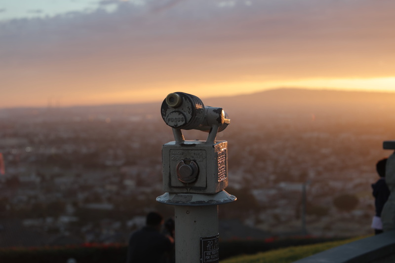 telescope, orange color, building exterior, technology, weaponry, observation point, architecture, coin-operated binoculars, hand-held telescope, united states