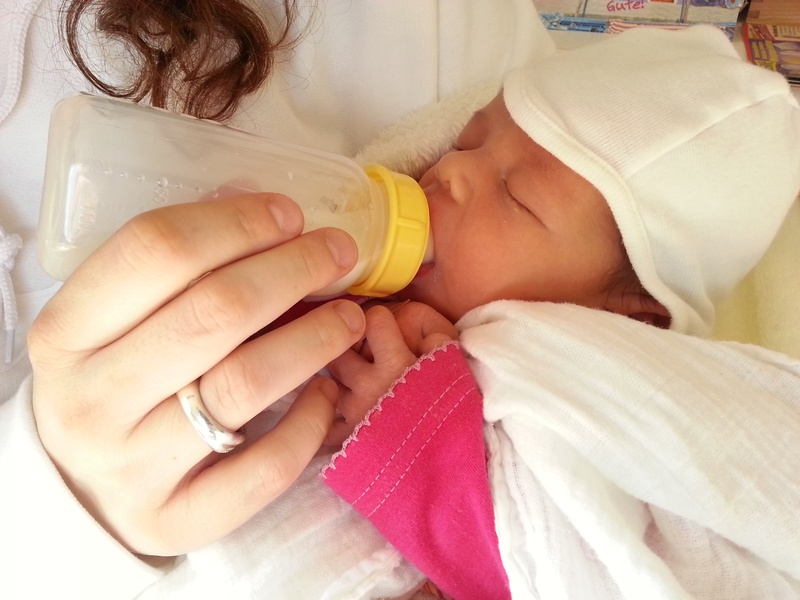 beanie, carrying, baby Bottle, child, care, two people, 2K, midsection, human hand, mother, young, beginnings, adult, positive emotion, bottle, lying down