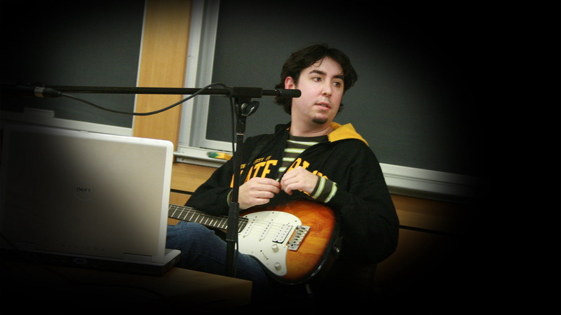 sitting, music, yellow, men, performance, young adult, computer, 1080P, musical instrument, microphone, portrait, indoors, guitar, studio, musical equipment