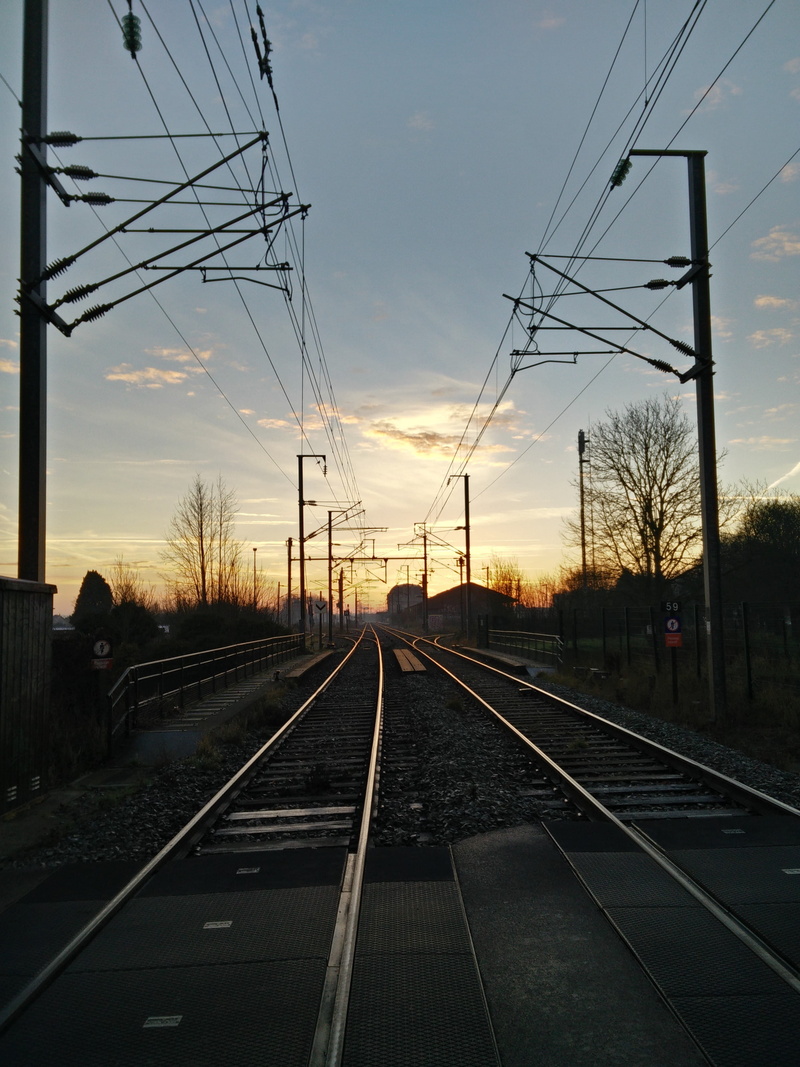 train, nature, the way forward, mode of transportation, power supply, france, outdoors, long, no people, sun, electricity pylon, cloud - sky, cable, track