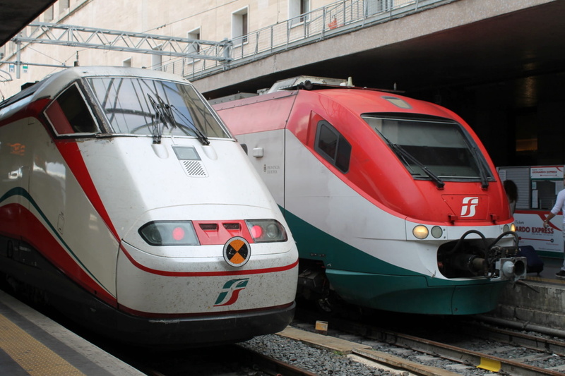 city, public transportation, train, vehicle, day, auto, stationary, green, travel, express train, rail transportation, window, built structure, no people