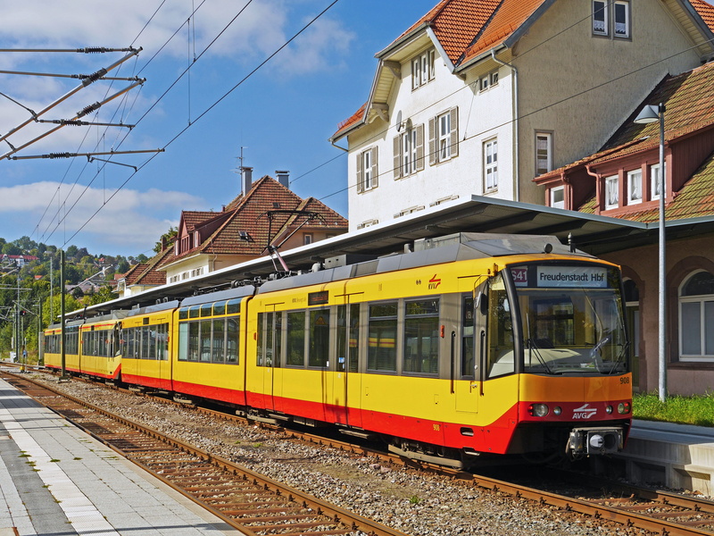 architecture, light rail, public transportation, joy city hbf, platform, overland track, mode of transportation, regional train, tram, day, land vehicle