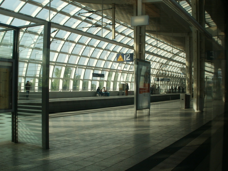 glass - material, flooring, track, city, no people, travel, indoors, building, railway, skylight, platform, day, architectural column, train station, rail transportation