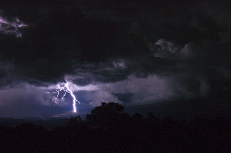 rain, electricity, thunderstorm, ominous, warning sign, beauty in nature, mountain, cloud - sky, lightning, dramatic sky, outdoors, tree, power, dark, striking