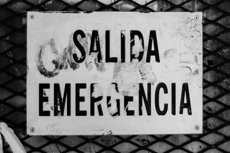 directly above, blackandwhite, graffitti, high angle view, text, madrid, script, outdoors, capital letter, day, advertisement, information, no people, grafiti