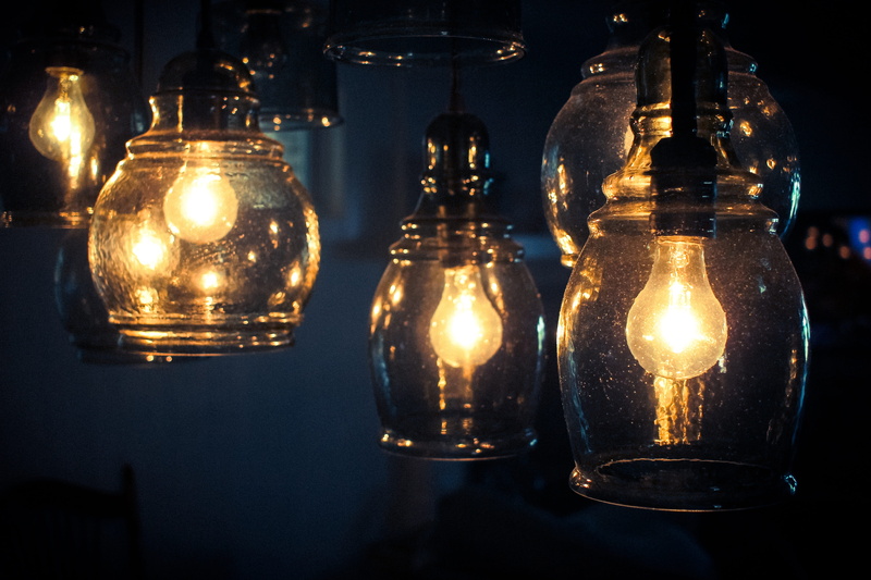transparent, no people, hanging, still life, luxury, ambience, black background, chandelier, 4K, glass, focus on foreground, glowing, lighting equipment
