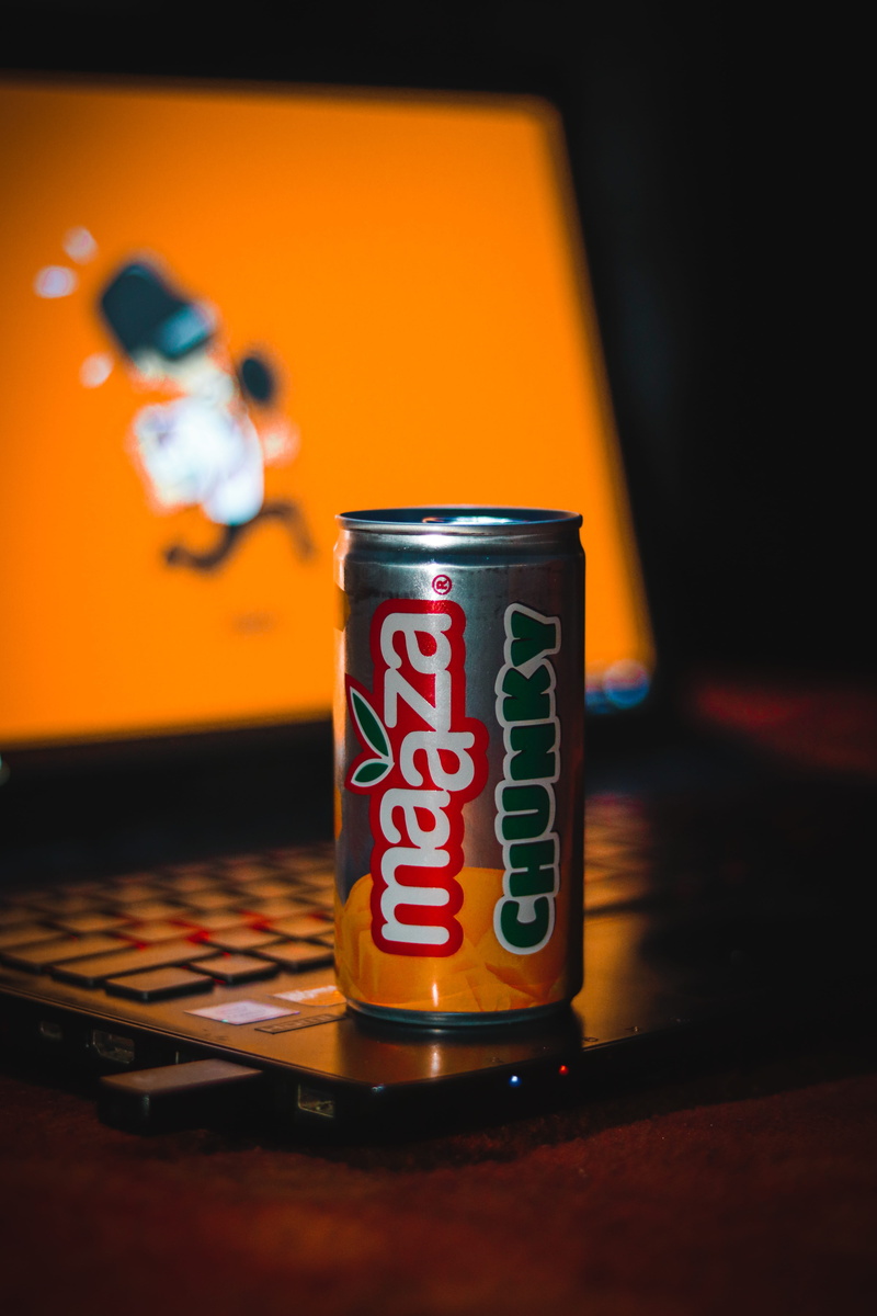 beverages, product, mug, still life, photography, food and drink, creativity, indoors, wood - material, container, focus on foreground, orange color, laptop