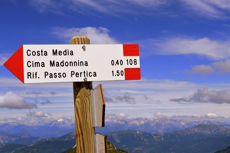 mountain peak, no people, day, signal, crossroads, road sign, clouds, sky, mountains, sign, mountain, guidance, landscape, blue, symbol, communication