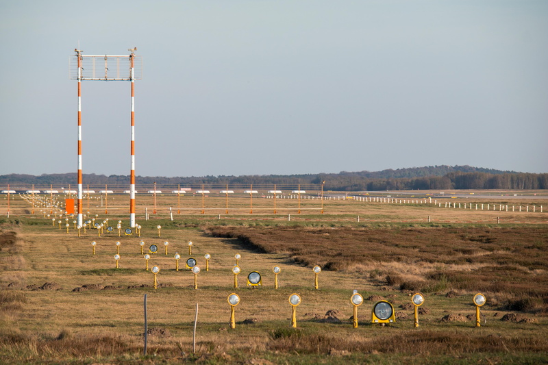 runway, opinion, lighting system, runway lighting, barrier, signals, wahner pagan, day, domestic animals, landscape, no people, fence, livestock, outdoors