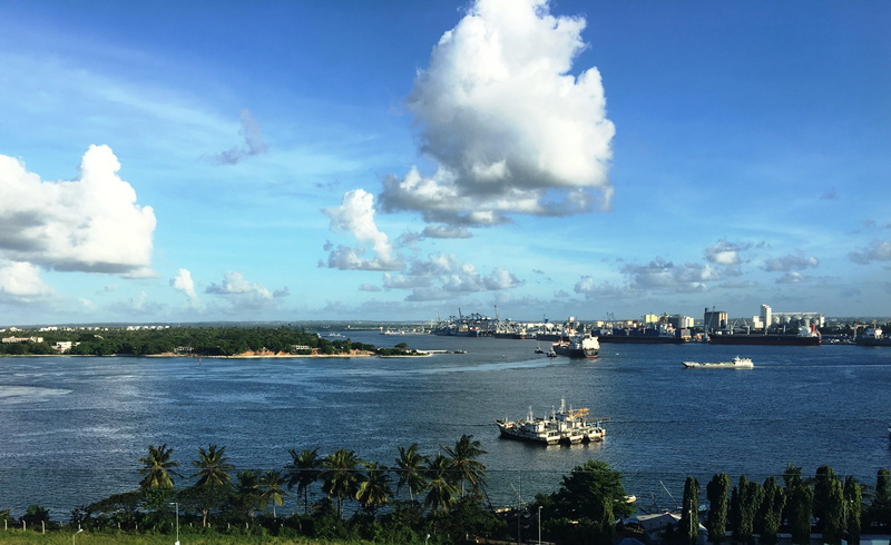 mode of transportation, travel, Africa, sea, ocean, architecture, built structure, cloud - sky, nature, Dar Es Salaam, scenics - nature, city, tranquility