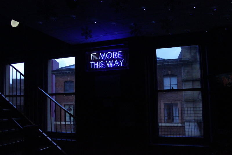 text, city Life, communication, way, railing, outdoors, 4K, staircase, western script, building Exterior, street, neon Light, illuminated, architecture