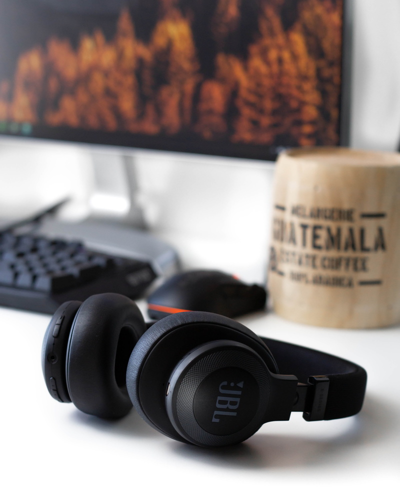 keyboard, headphones, jbl, text, wireless technology, focus on foreground, white, no people, arts culture and entertainment, digital camera, camera - photographic equipment
