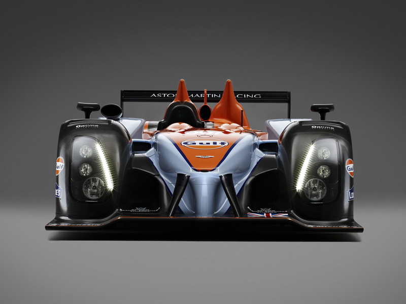 racing car, engine, auto Racing, formula, success, gray, sport, people, technology, black Color, still life, 2011, orange, car, sports Car, gray background