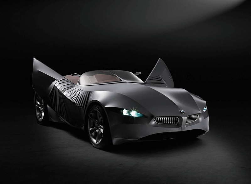 black background, visionary, car, indoors, 720P, silver colored, bmw, gina, night, stationary, mode of transportation, wealth, land vehicle, no people