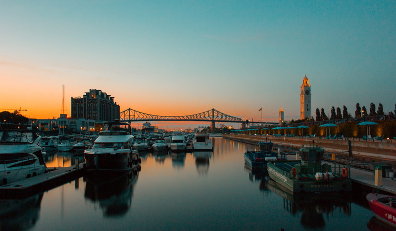 bridge - man made structure, boats, travel destinations, river, sky, built structure, city, transportation, canada, clear sky, sunset, bridge, montreal