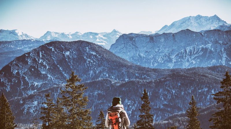 beauty in nature, mid adult, sky, jacket, plant, peak, red, cold temperature, scenics - nature, outdoors, land, person, summit, leisure activity, one man only