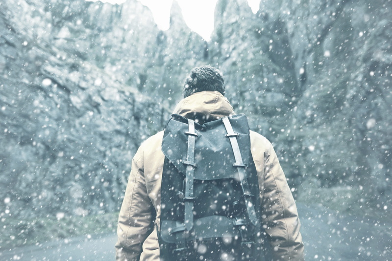 outdoors, valley, warm clothing, jacket, extreme weather, road, black, snow, mood, man, travel, nature, cold, landscape, adventure, away, ice, clothing