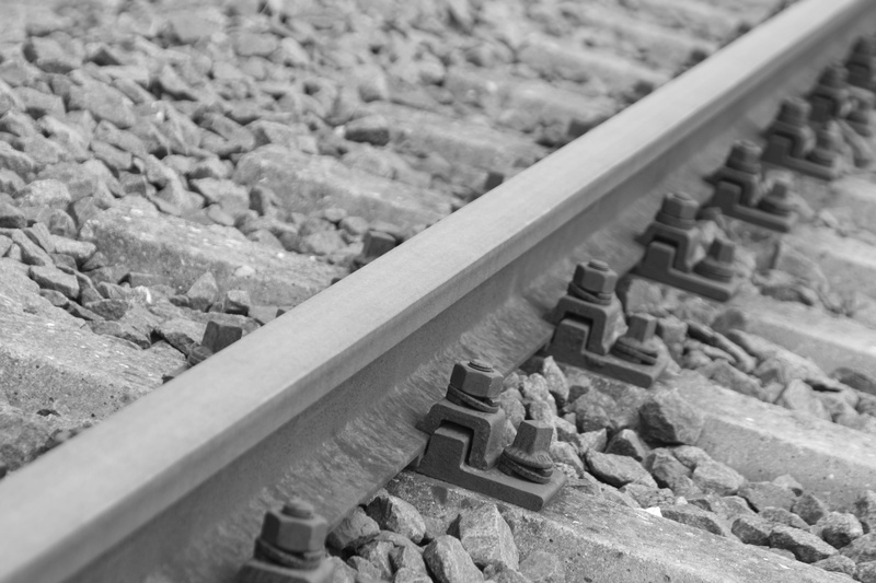 silver, railroad track, rock, high angle view, stone - object, surrounder, wood - material, food and drink, metal, stones, solid, focus on foreground, abundance