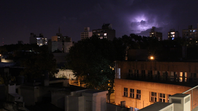 uruguay, cloud - sky, power in nature, storm, tree, built structure, illuminated, residential district, bolt, building, plant, buildings, cityscape, sky