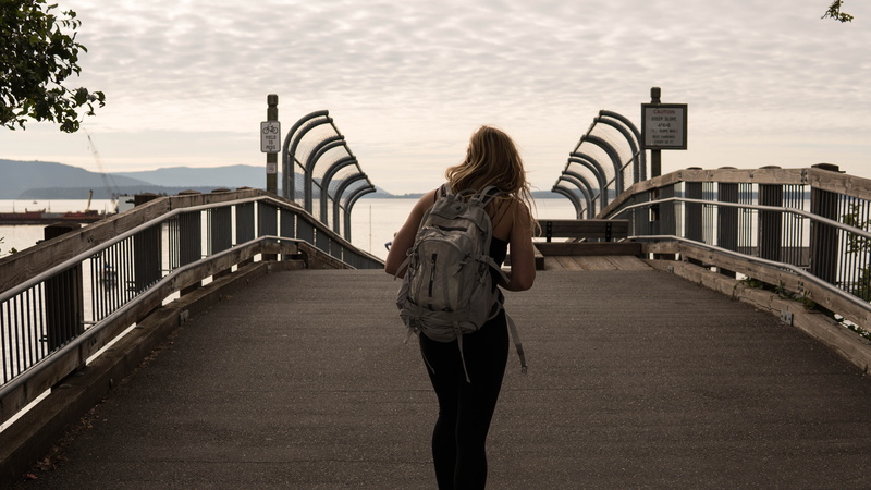 traveling, trevin rudy, person, outdoors, wa, backpack, walk way, 5K, one person, women, rear view, hair, board walk, architecture, grace, leisure activity