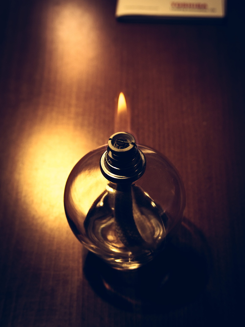 glass - material, lighting equipment, old, metal, indoors, girona, burning, little, oil lamp, raw, flame, house, smell, candle, table, close-up, fire - natural phenomenon