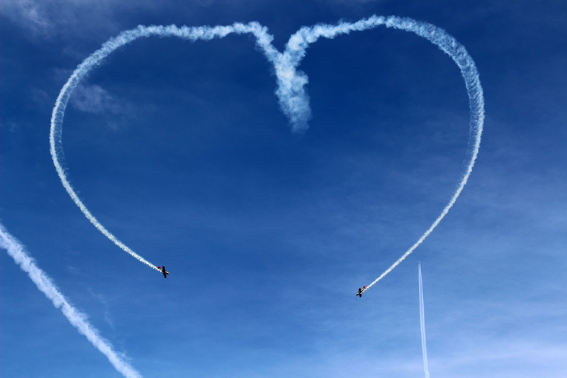 outdoors, on the move, motion, heart, showing, flying, no people, stunt, cloud - sky, mid-air, blue, aerobatic, 5K, sky, air, airplane, skill, aircraft wing