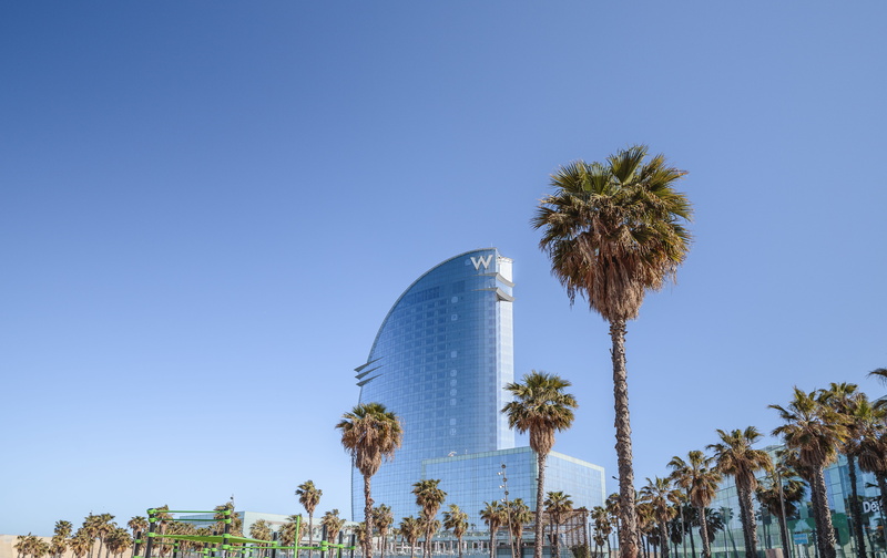 town, building, housing, palm tree, day, office building, travel destinations, building exterior, urban, sky, arecaceae, plant, city, passeig del mare nostrum