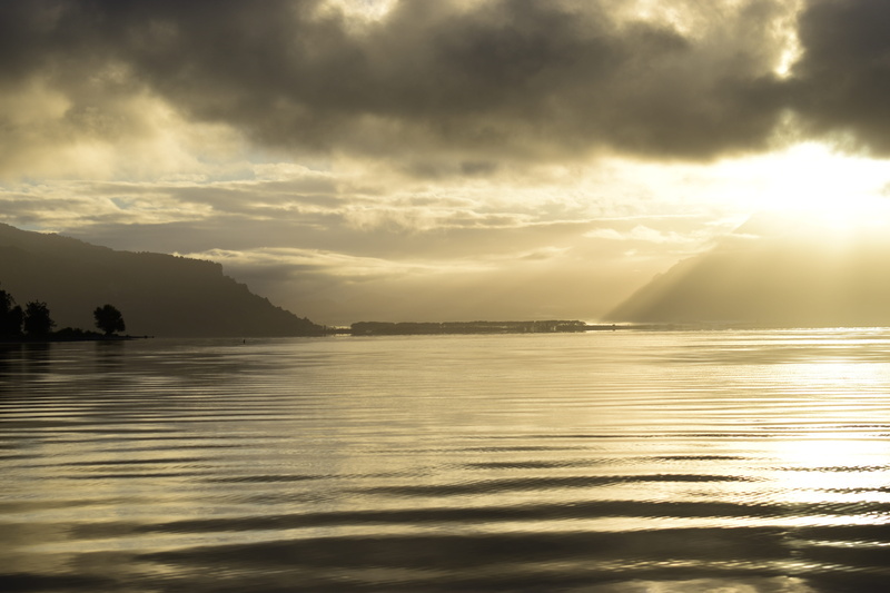 blue water, scenics - nature, lake puyehue, non-urban scene, mountain, sunbeam, nature, water, holiday, tranquility, trees, cloud - sky, mountain landscape