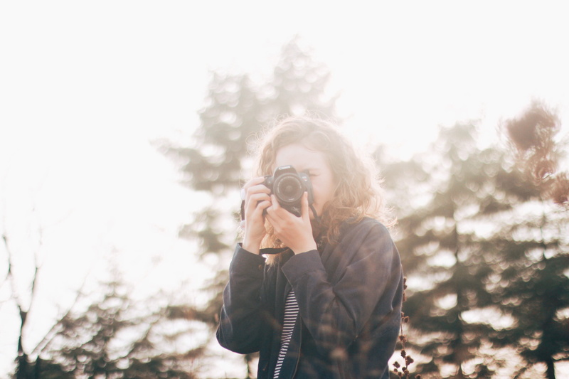 photo, hunting, one person, bird, girl, mammal, human, photography themes, person, front view, holding, standing, digital camera, photographic equipment