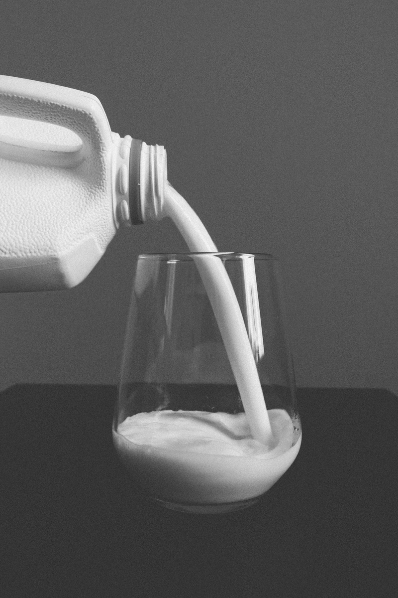 5K, wooden, bottle, motion, single object, Glass, Pour, no people, still life, grayscale, wall - building feature, absence, cup, Milk, simplicity, restaurant