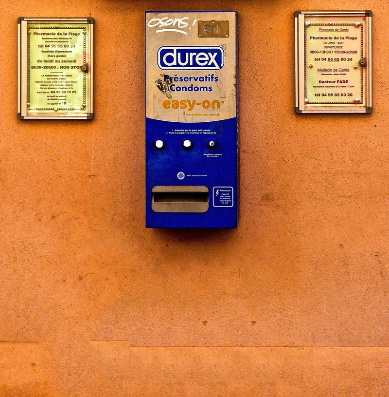 electricity, connection, architecture, script, technology, information, indoors, Dispenser, sign, built structure, text, fuel and power generation, Condoms