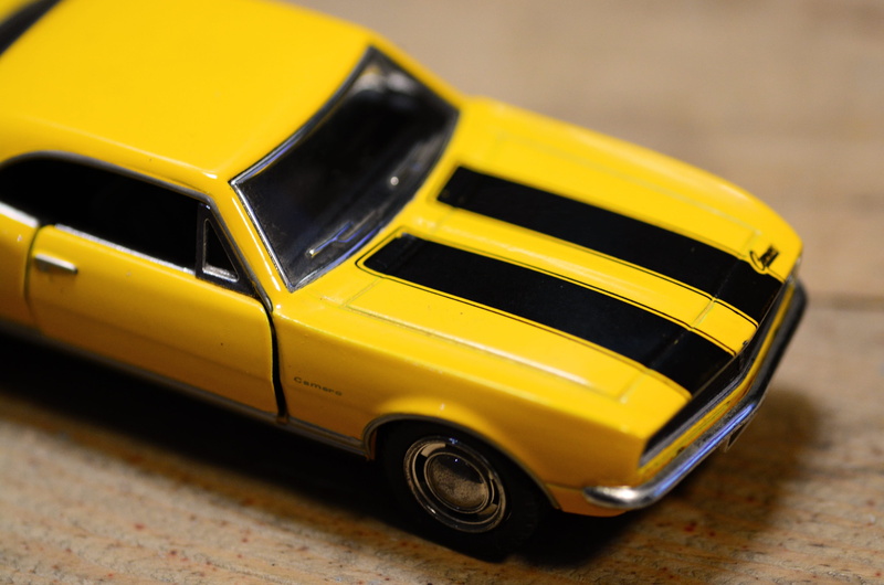 4K, die cast, diecast, vehicle, close-up, selective focus, toy, car, still life, indoors, day, land vehicle, no people, motor vehicle, yellow taxi, Toy