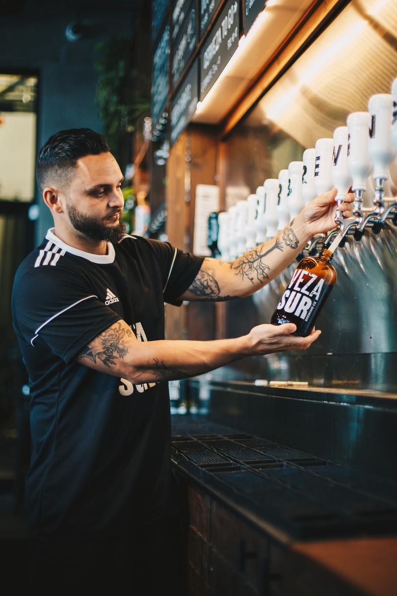 drink, waist up, photography, man, indoors, men, tattoo, bar sign, young men, restauant, 4K, refilling, young adult, human, beer, business, beverage, real people