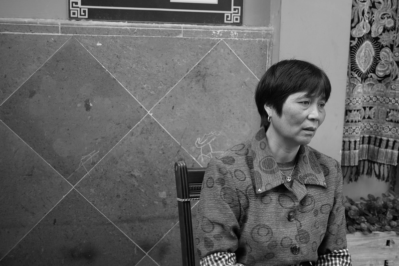 thinking, one person, young women, china, front view, looking away, lifestyles, hairstyle, leisure activity, people, unhappy, chinese, bangs, architecture