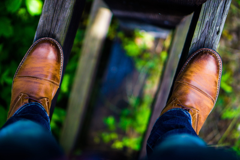 land, man, outside, human foot, leather, 5K, outdoor, body part, stepping, shoes, low section, quest, personal perspective, dress, day, limb, shoe, photography