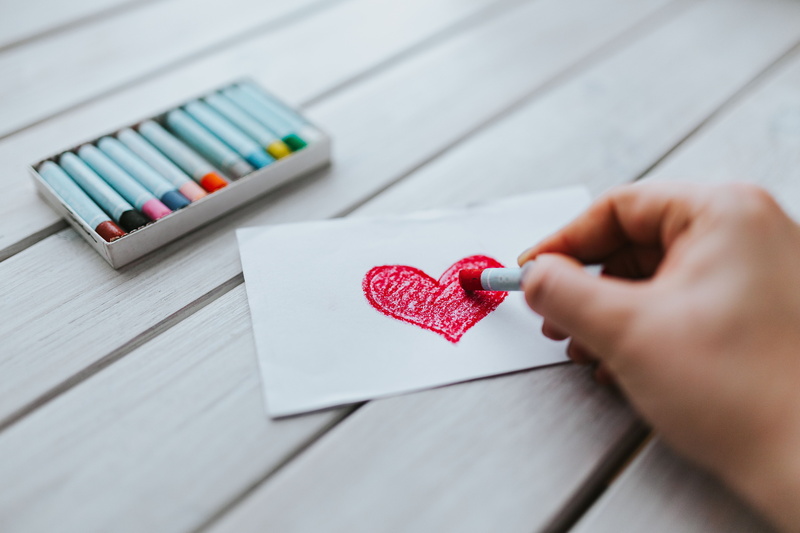 5K, human hand, craft, heart, holding, education, beloved, positive emotion, symbol, art, indoors, close-up, one person, crayon, backgrounds, wood - Material