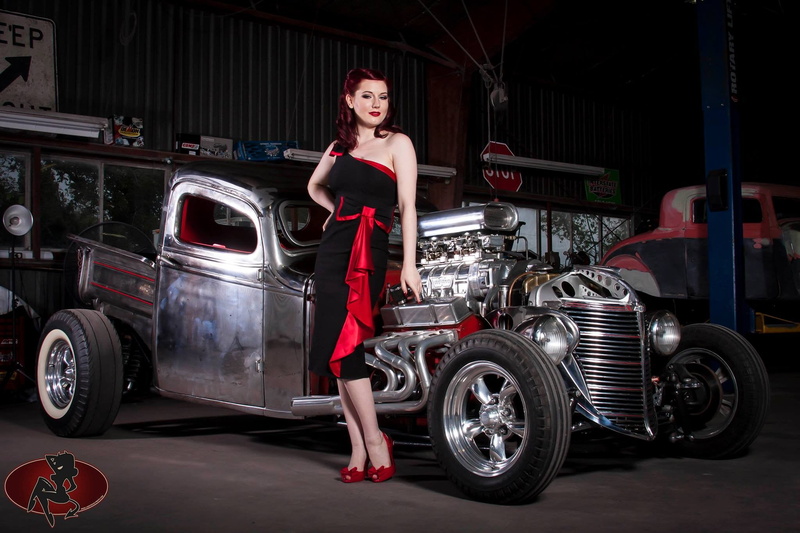 women, mode of transportation, car, one person, model, motor vehicle, land vehicle, dress, lifestyles, looking at camera, tire, portrait, hairstyle, smiling