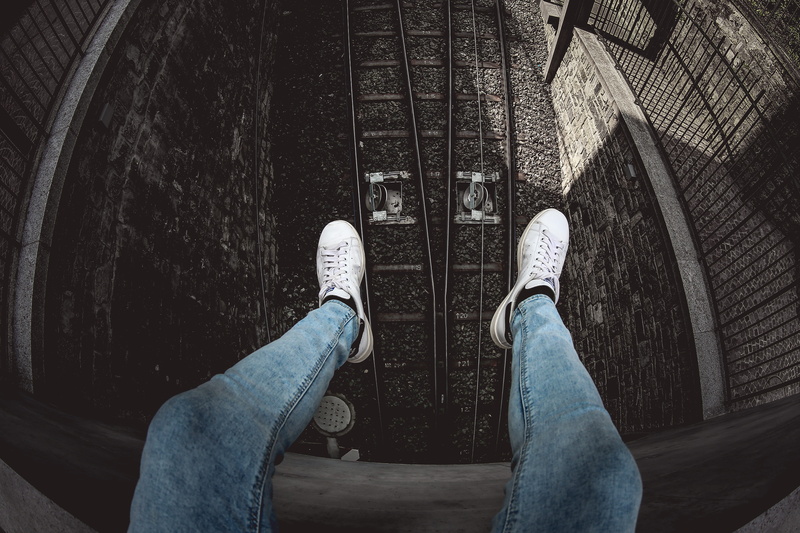 man, high angle view, human body part, sneakers, top, blue, daredevil, personal perspective, railroad, jeans, outdoors, day, high angle shot, leisure activity