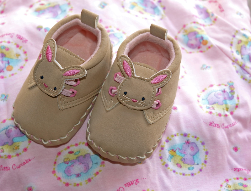 shoes, decoration, brown, crib, multicolored, fashion, high angle view, indoors, traditional, textile, little, elephant, precious, girl, representation