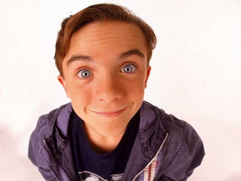 child, student, indoors, one person, front view, malcolm in the middle, hairstyle, studio shot, zip, white background, purple, looking at camera, human face