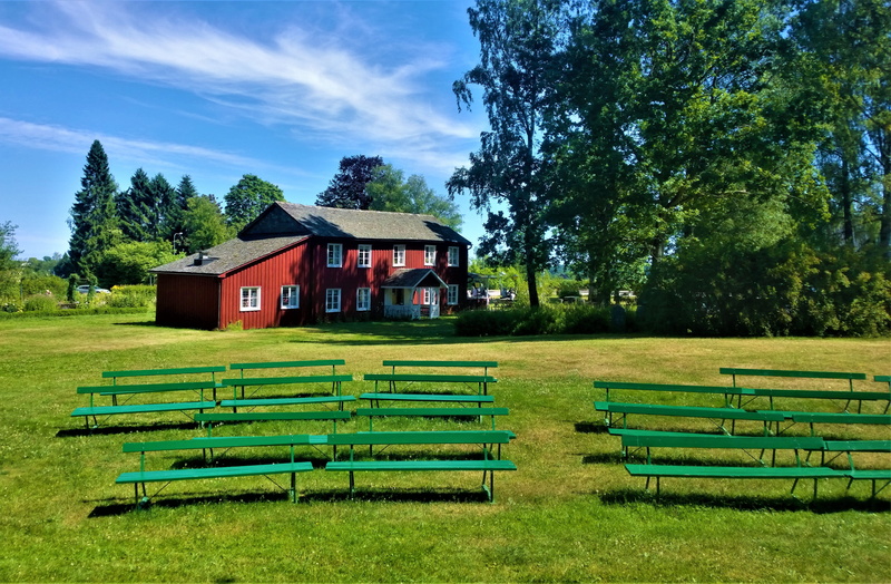 house, rural scene, bench, tranquility, blue sky, summer day, sky, countryside, built structure, outdoors, park bench, red, land, summer time, day, green color