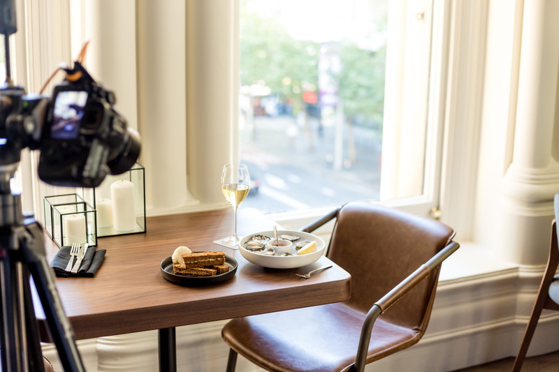 apparel, dining table, focus on foreground, glass, tabletop, plate, food and drink, ready-to-eat, meal, drink, no people, table, dish, dining room, furniture