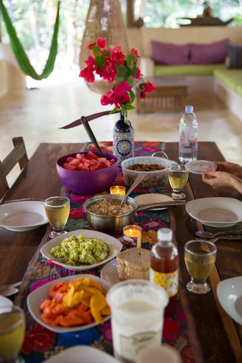 glass items, household equipment, drinking glasses, inside, drinking glass, table setting, indoors, flower, food, glasses, wine, meal, tablecloth, ready-to-eat