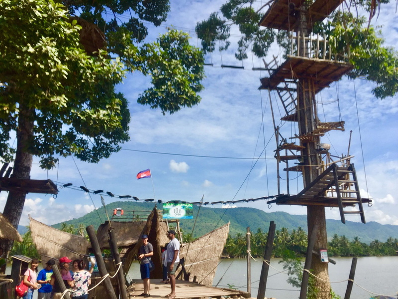 people, cable, flag, real people, men, outdoors, lifestyles, 2K, water, sky, technology, adult, mountain, day, group of people, tree, plant, architecture