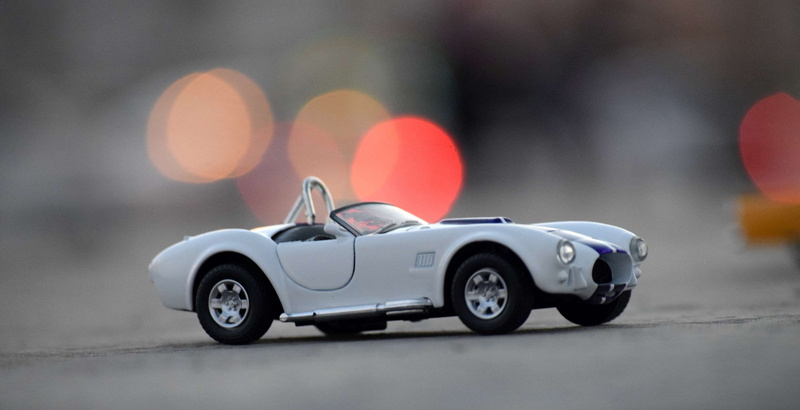 city, driving, luxury, mode of transportation, shiny, security, 4K, excitement, sign, toy car, defocused, diecast cars, motor vehicle, vintage car, selective focus